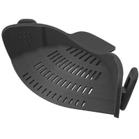 Black silicone grill basket on a white background
